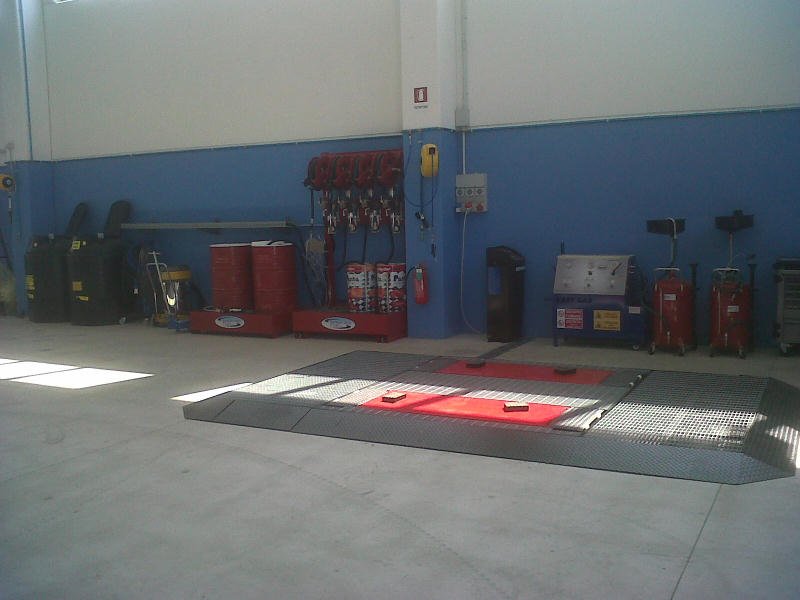 Isola di bonifica con sollevatore,grigliato e impianto aspirazione